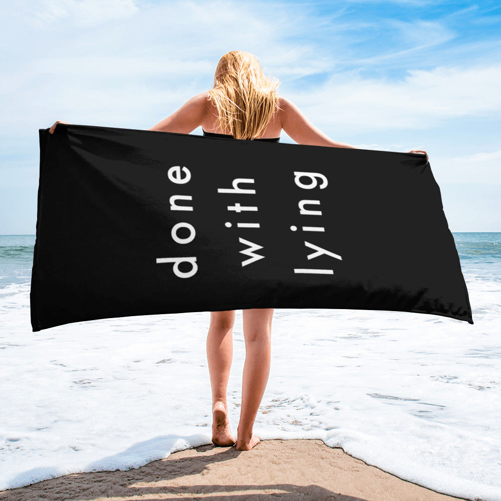 lying | beach towel